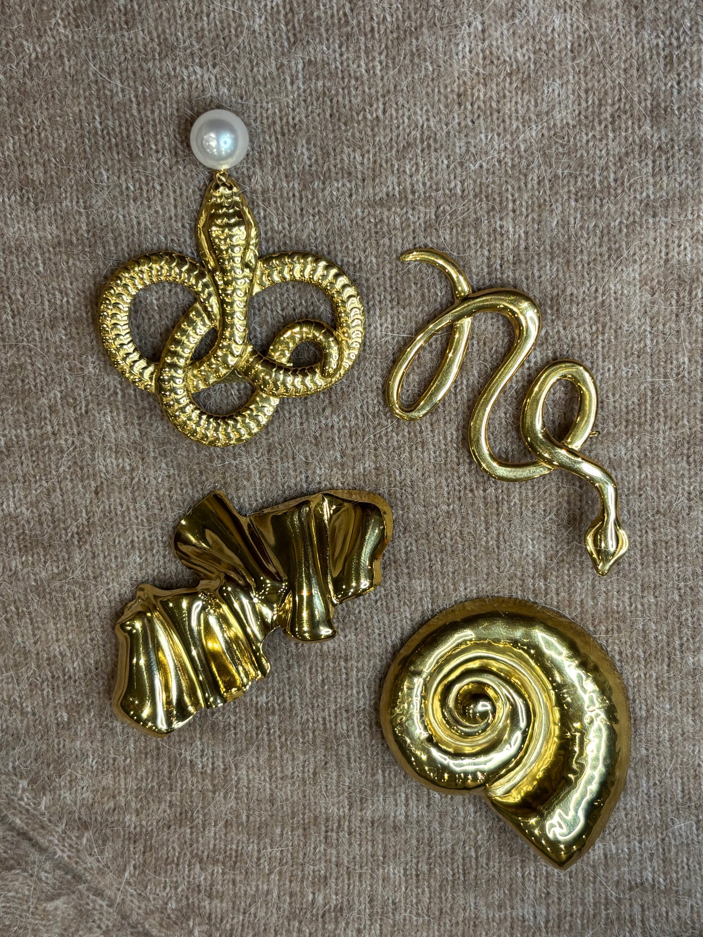 Gold snake brooch