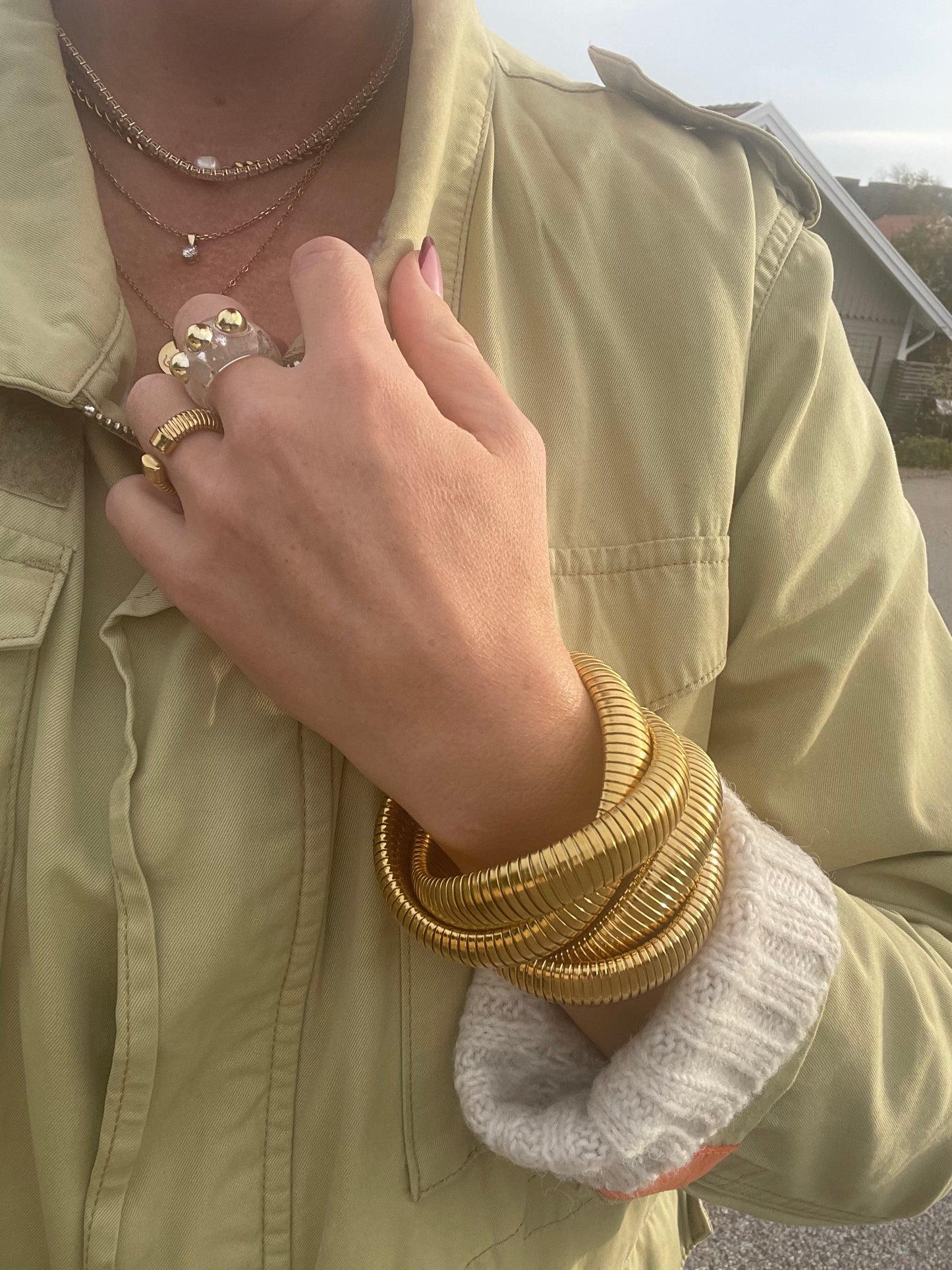 Double elastic gold bangle