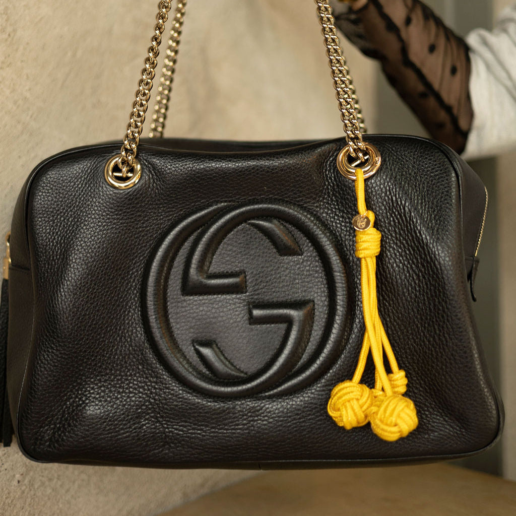 Yellow knot bag charm