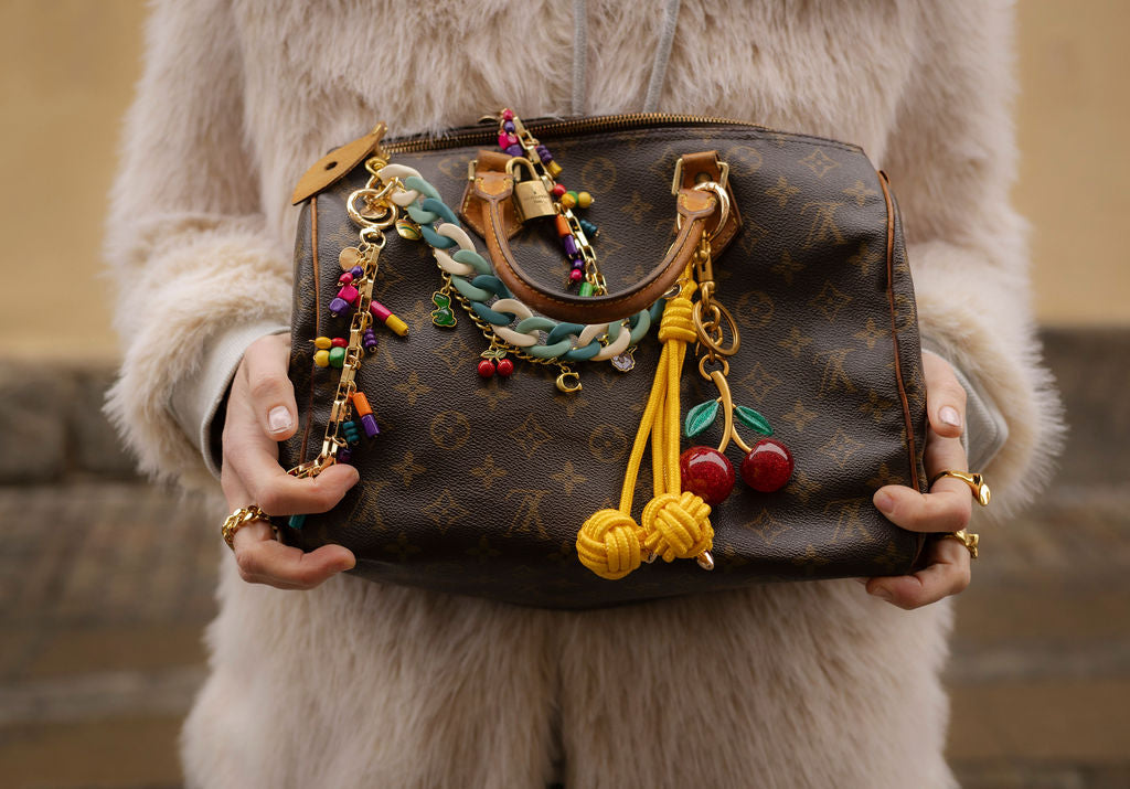 Yellow knot bag charm