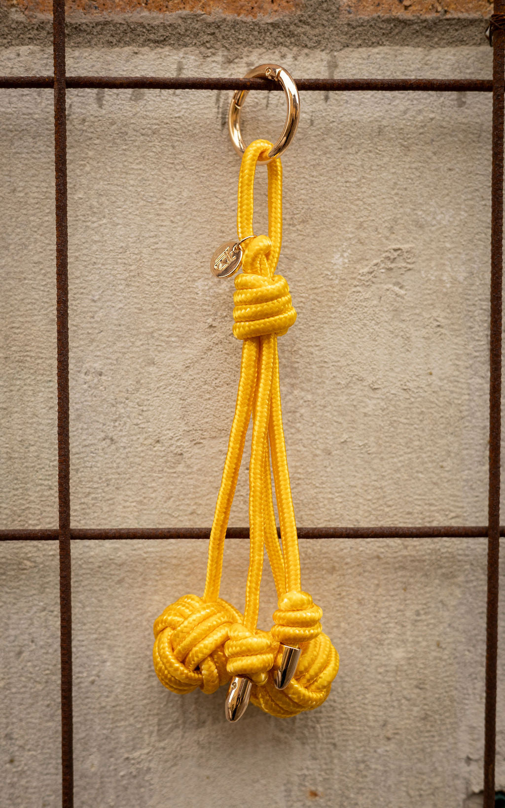 Yellow knot bag charm