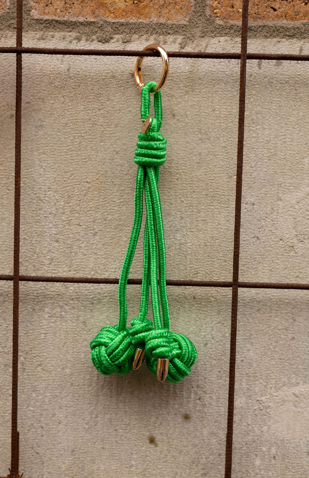 Green knot bag charm
